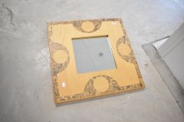 A modern decorative marquetry wall mirror, Dorset made, with wall mount, approx. 61 x 61cm
