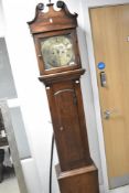 A 17th Century long case clock having 30hr movement (faux eight day holes) with brass 11 inch dial
