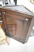 A 19th Century oak corner cupboard, height approx. 94cm