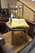 A traditional spindle back childs chair