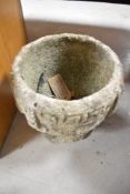 A concrete planter, height approx. 25cm