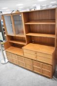 A vintage teak Nathan squares style wall unit, width approx. 153cm