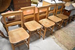 Seven traditional chapel chairs