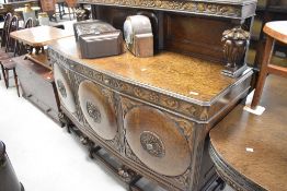 A carved oak 'lees' sideboard, width approx. 153cm