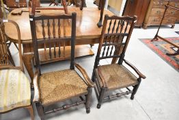 Two 19th Century vernacular spindle back low seat carver chairs