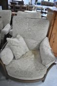 A pair of Ercol easy chairs, Renaissance style , mid colour
