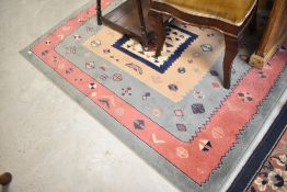 A modern Kazak style rug, multishades , with part printed label, approx. 227 x 160cm