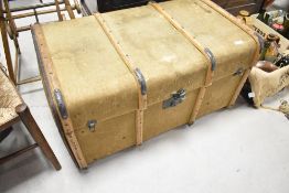 A vintage canvas covered travel trunk, labelled Albion , width approx. 83cm