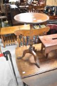 An early 20th Century mahogany and inlaid occasional wine table