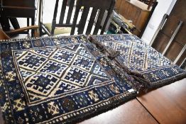 A traditional Afghan woollen carpet saddle bag of large proportions, open size approx. 135 x 70cm