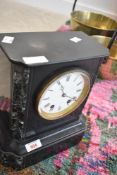 A Victorian black slate mantel clock