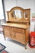 An early 20th Century mirror back sideboard, width approx. 138cm