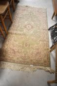 A traditional fireside rug, approx. 160 x 84cm