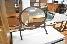 An Edwardian mahogany toilet mirror