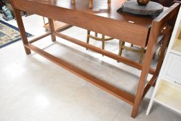 A vintage teak altar table , approx. width 188cm, depth 61cm