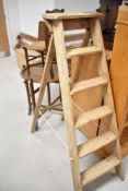 A set of vintage stripped step ladders