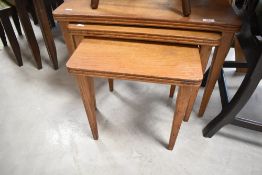 A Gordon Russell designed vintage nest of three tables, overall width approx. 62cm, bearing label