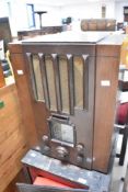 A vintage Pye valve radio, having open back , with bakelite controls