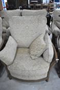 A pair of Ercol easy chairs, Renaissance style , mid colour