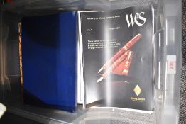 A collection of Writing Equipment Society Journals and three of the WES White Book Series 2A, 2B and