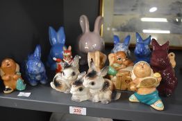Fourteen assorted rabbit studies including Royal Doulton 'Christmas Surprise Bunnykins', Sylvak