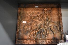 A Spanish folk art solid wooden plaque, the carving depicting Don Quixote and Sancho Panza, h39cm