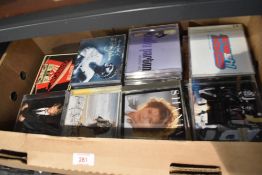 A Compact Disc collection - around fifty titles with rock , pop , country and more