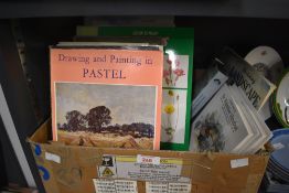 A box containing various history of art / beginners guide handbooks, to include pastel, sketching,