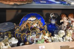 An assortment of items including a pair of Bohemia hand painted green glass perfume bottles, a