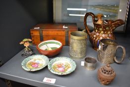 An assorted selection of items including a wooden part lined box having brass inlays, a plated