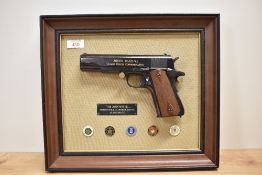 John Wayne Commemorative Armed Forces M1911 .45 Automatic handgun. An exact replica of the M1911A