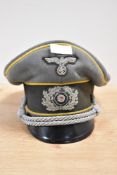 World War Two German Cavalry Officer peaked cap in field grey cloth with dark green central band and
