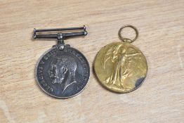 British World War One medal pair, British War Medal and Victory Medal impressed 10010 PTE. E.