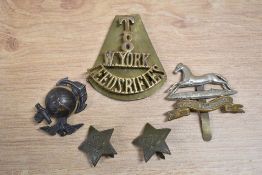 World War One West Yorkshire cap badge, together with WW1 Leeds Rifles T8 W.York shoulder titles,