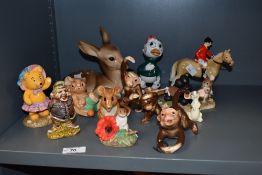 A selection of ceramic figures, to include three monkeys, a fox hunting figure, a garden gnome