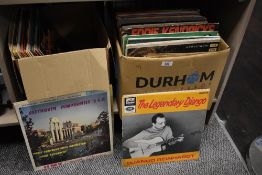 Two large boxes of assorted vinyl records including The Beatles, Billy Connolly and ABBA etc.