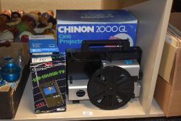 A Chinon 2000 GL Cine Projector complete with box sold alongside a Citizen pocket colour