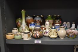 A group of early 20th century Royal Bayreuth miniature vases having silver hall mark rims, largest