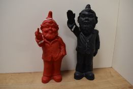 A small red cast plastic novelty swearing gnome sculpture, h35cm, sold together with a black gnome