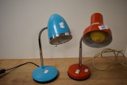 A red retro metal desk lamp having flexible neck, h32cm, sold together with another retro style desk