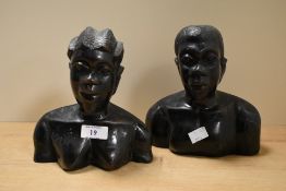 A pair of African hardwood busts of a male and female, h18cm