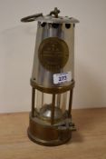 A vintage brass protector lamp, having central plaque with model number 'type 6', makers mark for