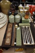A selection of oriental items including chopsticks, teacups, teapot and a wooden mould etc.