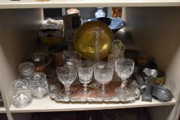 An assortment of silver plated, brass and pewter ware, to include candletsicks, serving tray,