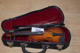 A vintage miniature wooden violin with bow and case, L20cm