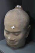 A large fibre glass bust depicting Buddhist King Jayavarman VII, h42cm