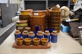 Three large Hornsea flour lidded jars, h21cm, sold together with various other Hornsea table ware, (