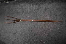 A late 19th / early 20th century wooden farm pitchfork, h153cm
