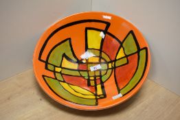 A large Poole Pottery Delphis pattern fruit bowl, if dished circular form decorated with abstract