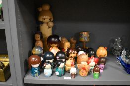 A hand carved Japanese wooden doll, signed to base, h33cm, sold together with various other wooden
